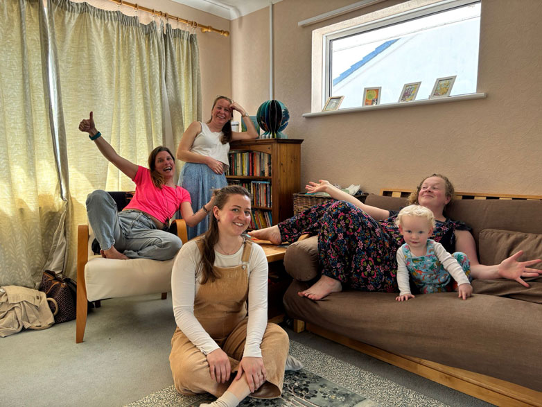 Dorset Doulas team and families in a warm, welcoming home setting